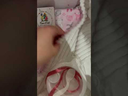 Muñeca española "Baby RN Little Bunny"